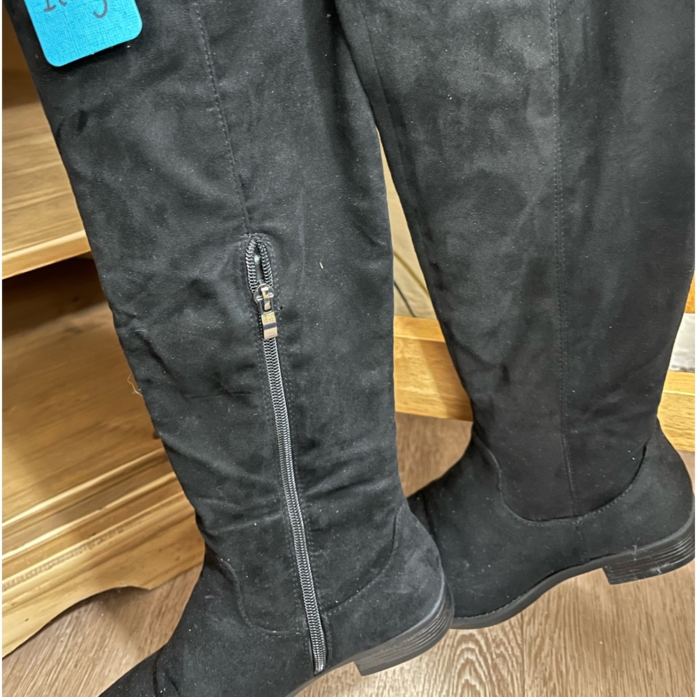Black suede Boots.